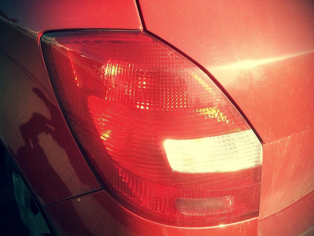Dim brake lights